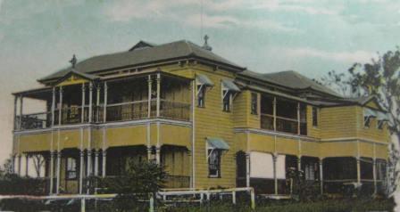 Historic timber school building reflecting early Catholic education foundations and community heritage